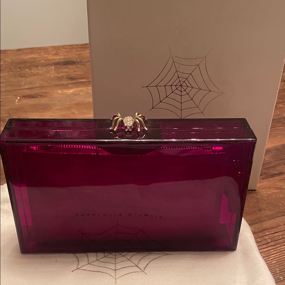 Charlotte Olympia Fuchsia and Gold clutch